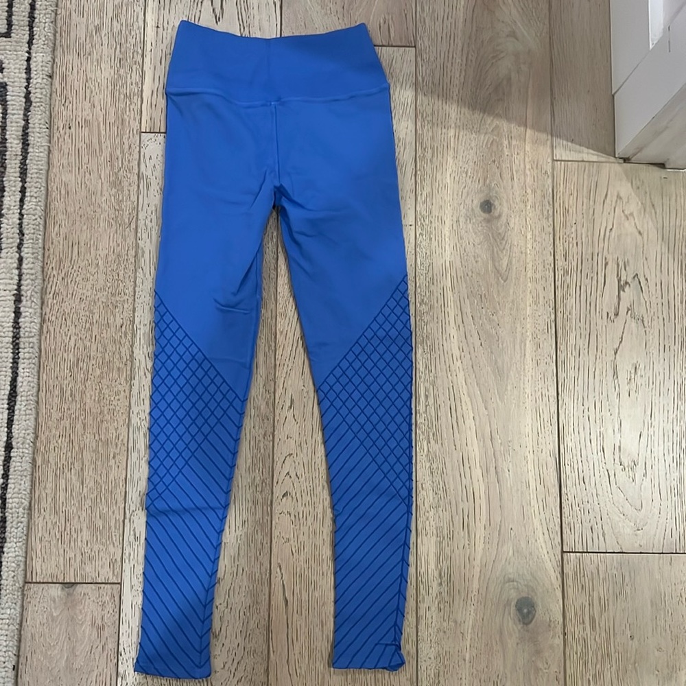 NUX blue leggings with pattern down legs